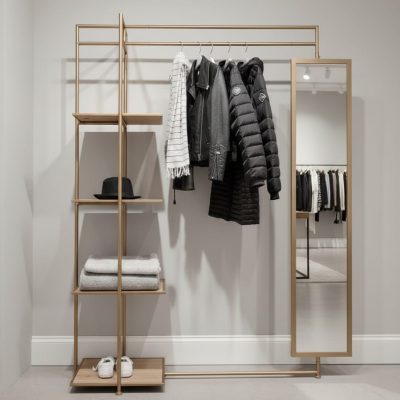 استاند عرض ملابس ديكوري مودرن فاخر مع رفوف جانبية ومرآة – تصميم هندسي معاصر من Stand Egypt